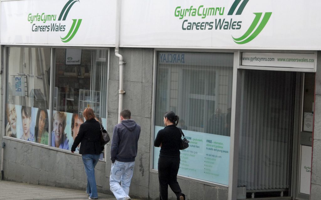 People walking past a job centre