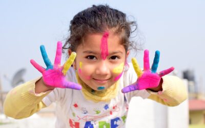 A girl with paint on her hands